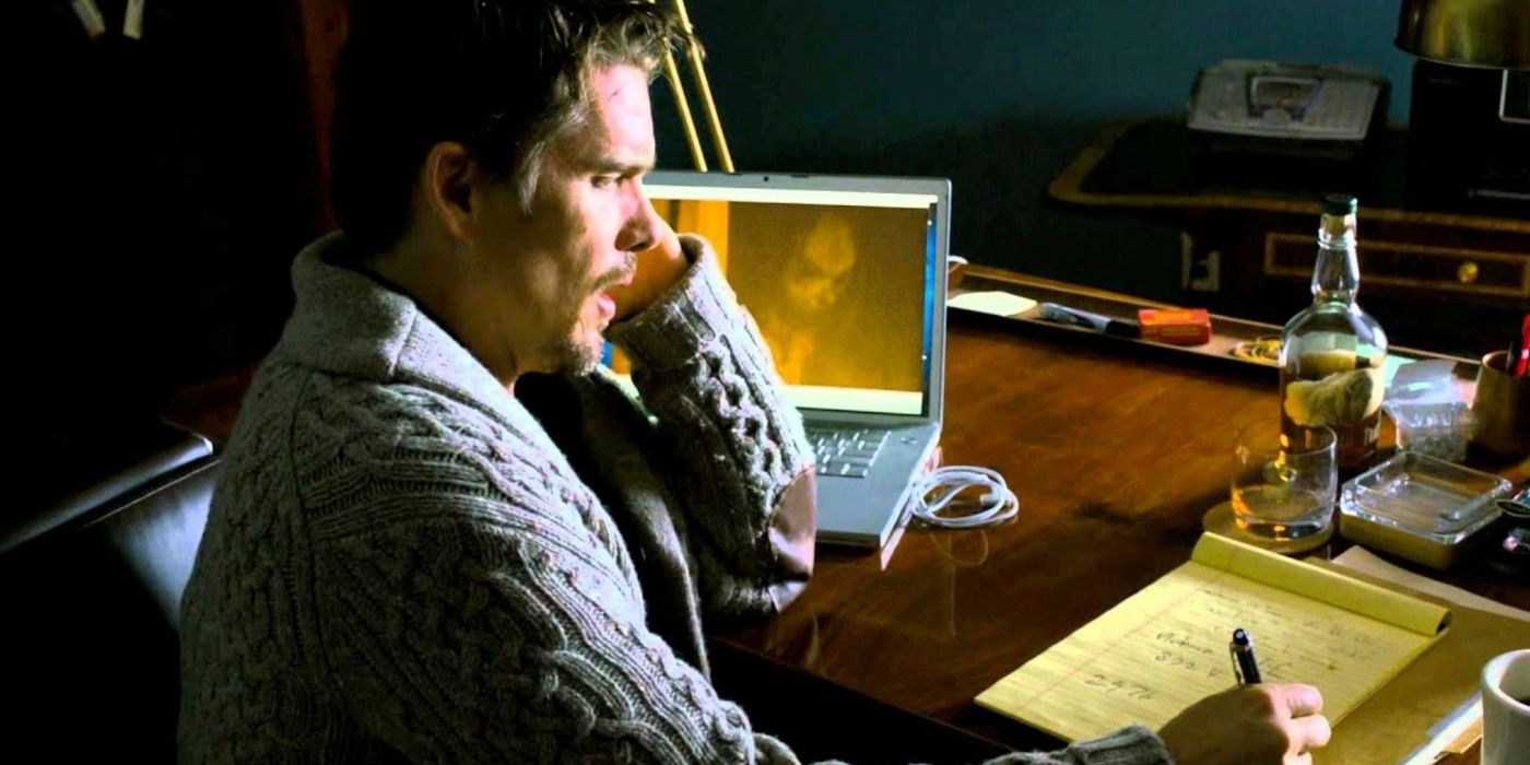 Ellison on the phone while the demonb Bhagul appears on his laptop screen in &lsquo;Sinister&rsquo; (2012)