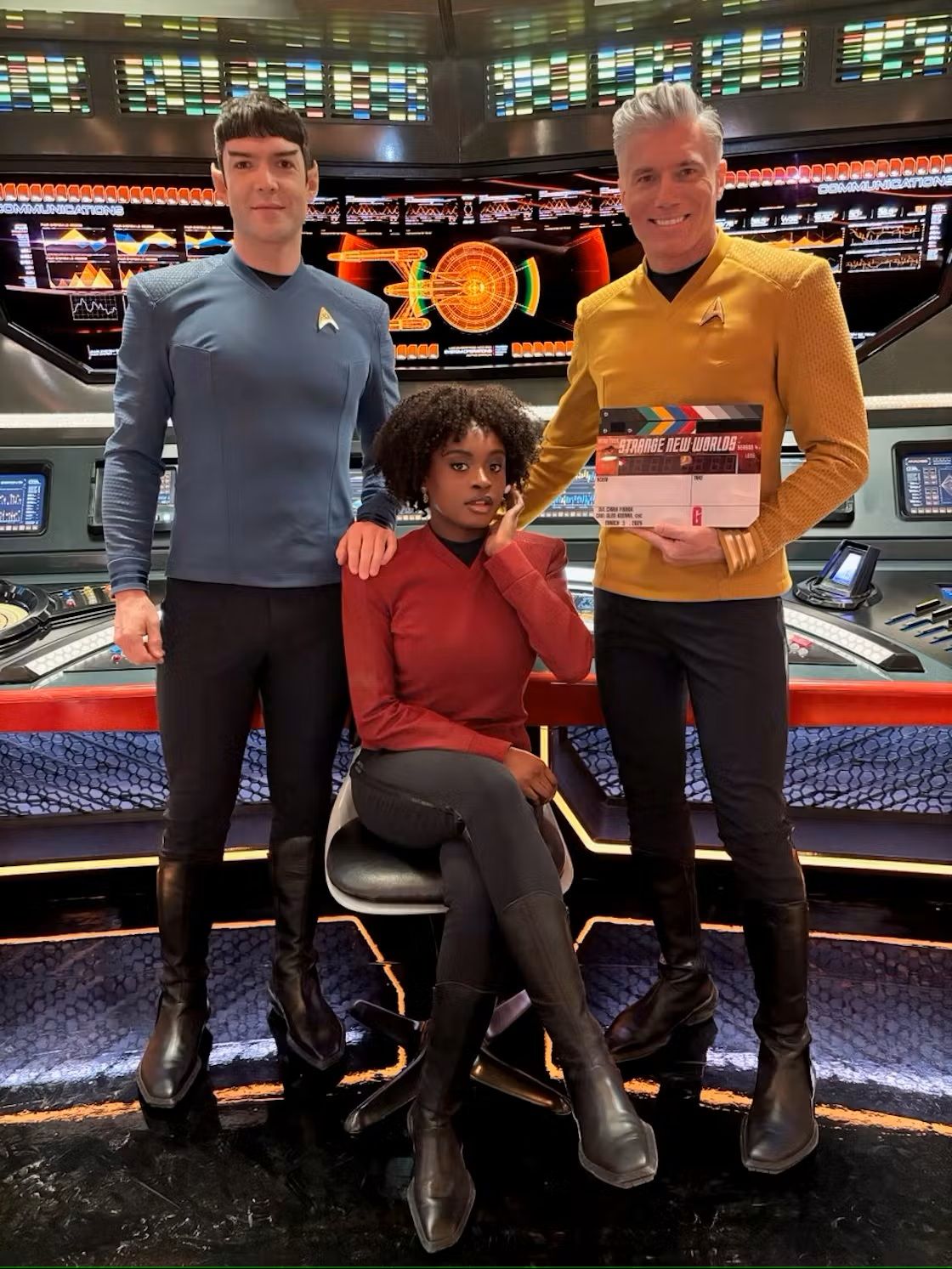 Ethan Peck as Spock, Celia Rose Gooding as Uhura, and Anson Mount as Captain Pike on the set of Star Trek: Strange New Worlds.