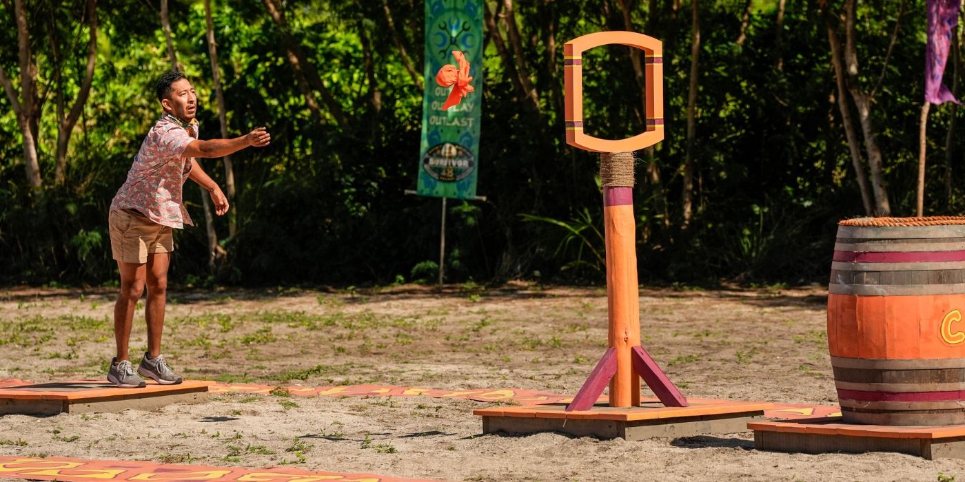 Mitch tosses a sandbag during an Immunity Challenge on &lsquo;Survivor 48.'