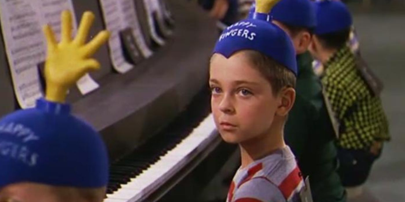 Tommy Rettig as Bartholomew Collins at a piano in The 5000 Fingers of Dr. T 