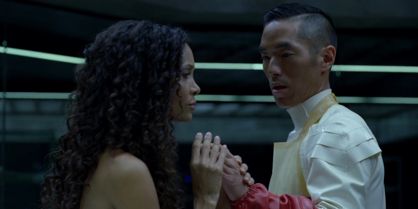 A Delos technician touches Maeve&rsquo;s hands