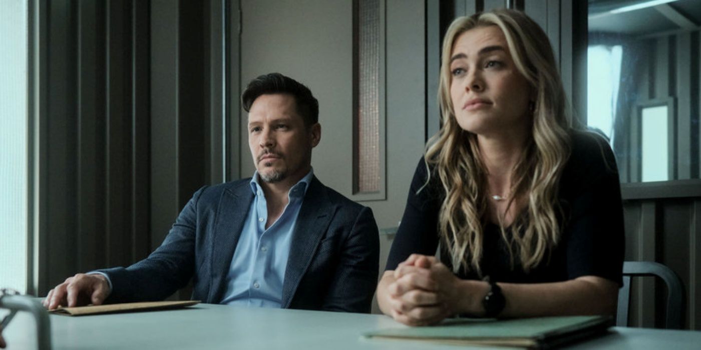 Nick Wechsler as Oliver Odell sitting at a table next to Melissa Roxburgh as Bex in The Hunting Party