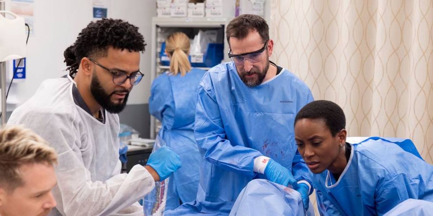 Heather Collins (Tracy Ifeachor), Robby (Noah Wyle), and Donnie (Brandon Mendez Homer) helping a patient give birth in The Pitt.