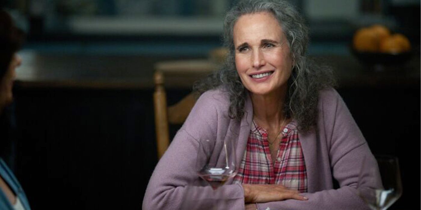Andie MacDowell smiling at a table in The Way Home Season 3