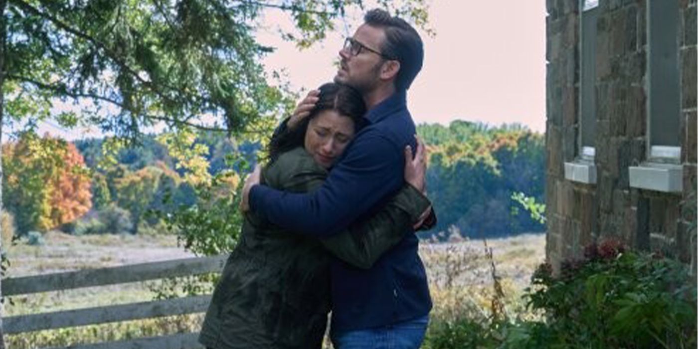 Elliot hugging a crying Kat outside their house in The Way Home Season 3