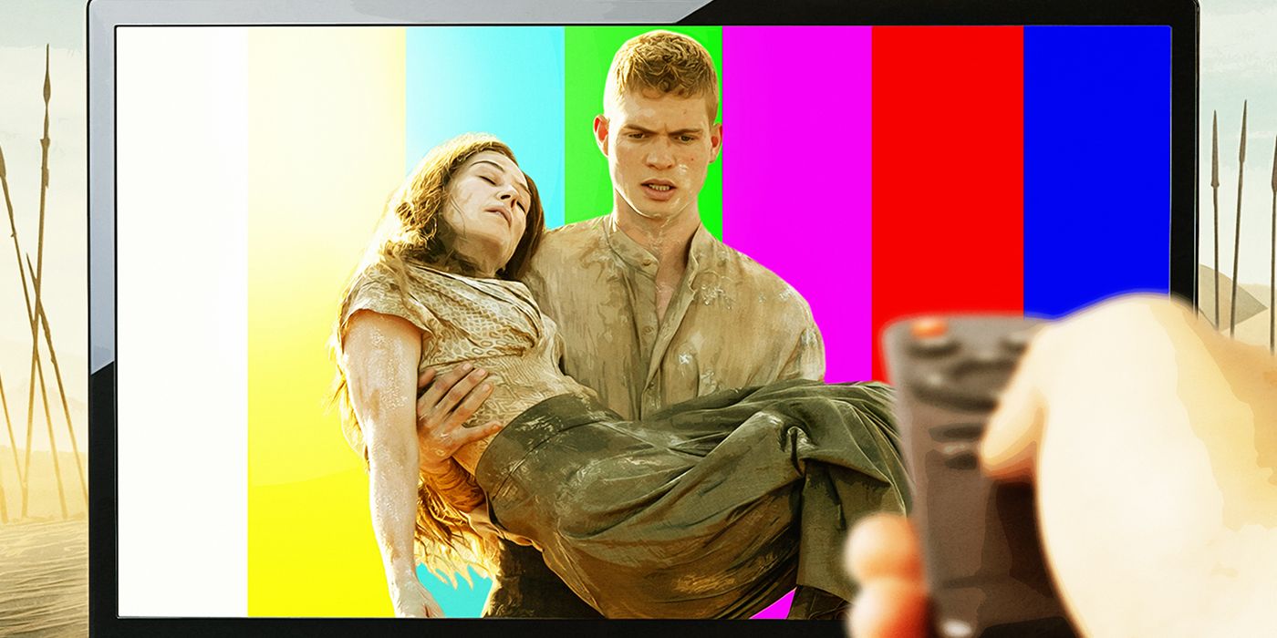 Rosamund Pike and Josha Stradowski in the Rhuidean episode on a TV