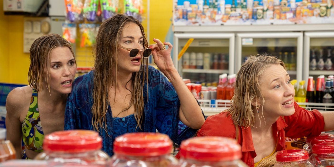 Carrie Coon, Leslie Bibb and Michelle Monaghan hiding in convenience store in The White Lotus Season 3, Episode 4.