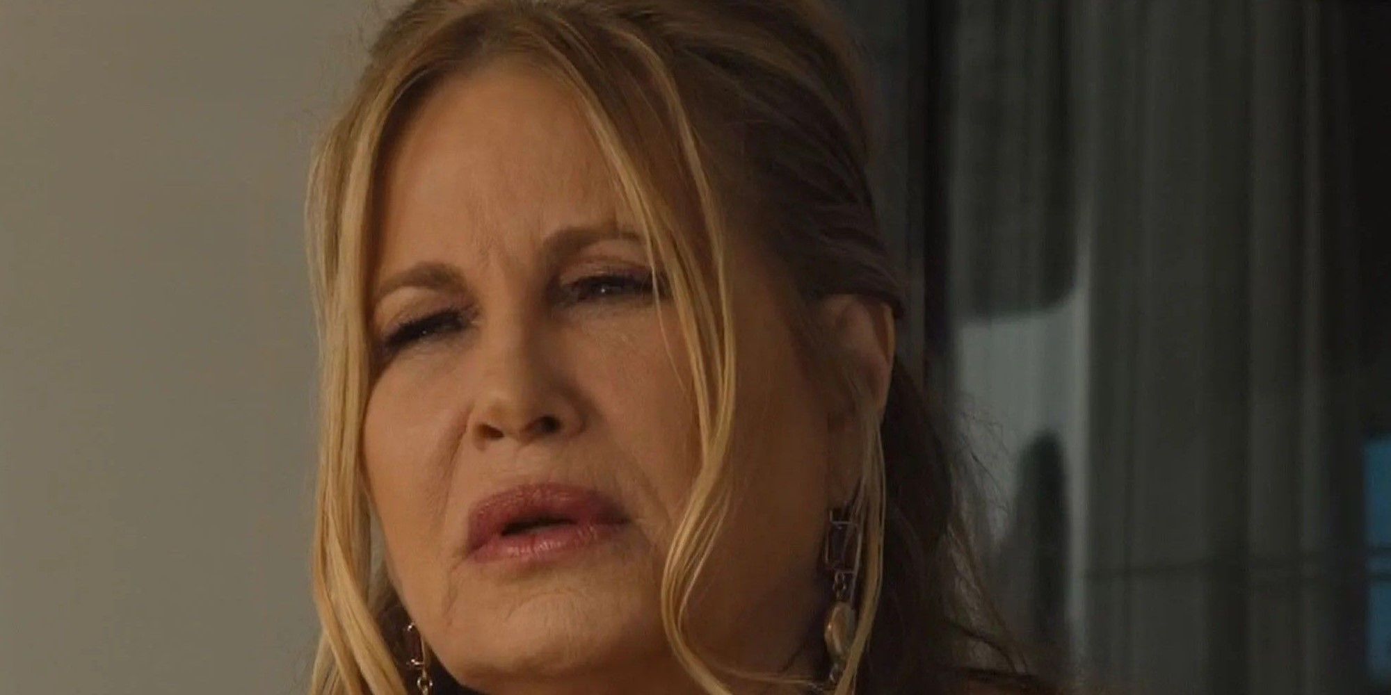 Jennifer Coolidge as Tanya looking puzzled at something off-camera in The White Lotus Season 2 finale.