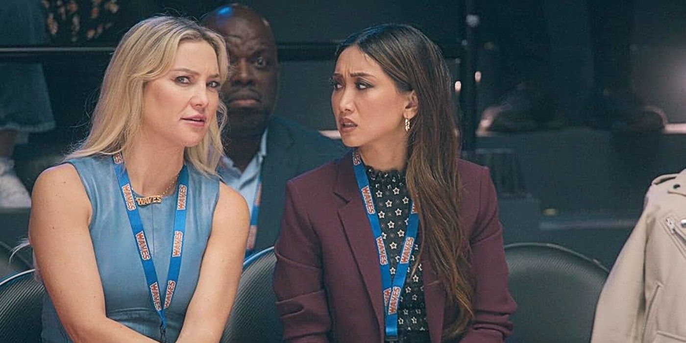 Isla Gordon and Ali Lee sitting at a basketball game together in Running Point.
