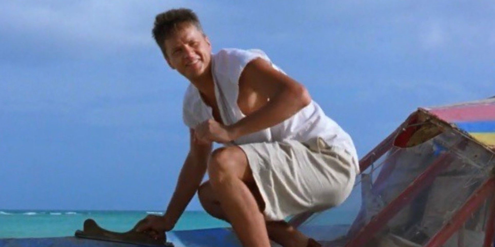 Andy at the beach looking behind at something in The Shawshank Redemption
