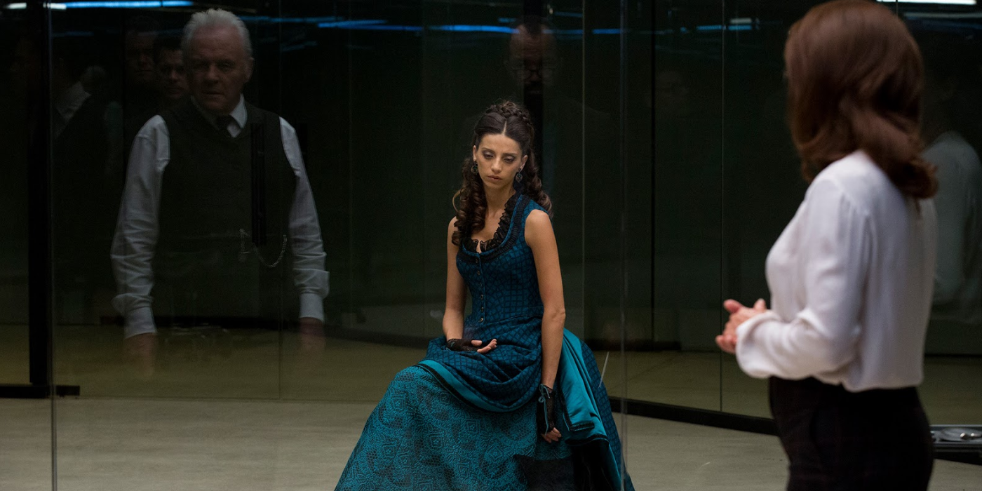 A broken down Clementine (Angela Sarafyan) is being checked by Theresa (Sidse Babett Knudsen), while Dr. Ford (Anthony Hopkins) observes from outside the room