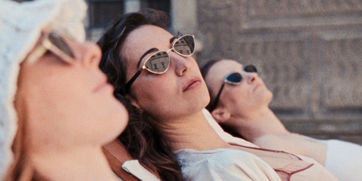 Three women sunbathing in Glorious Summer