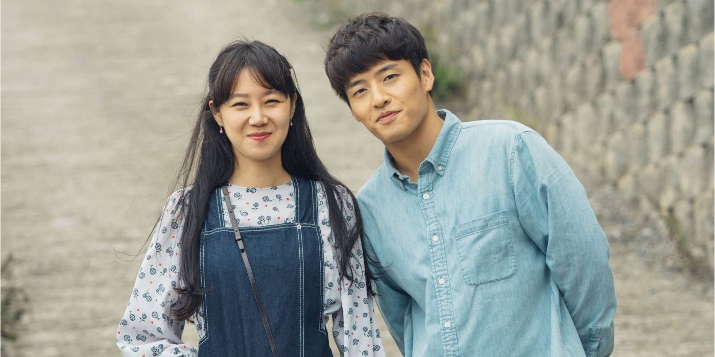 Gong Hyo-jin and Kang Ha-neul standing side by side in When the Camellia Blooms.