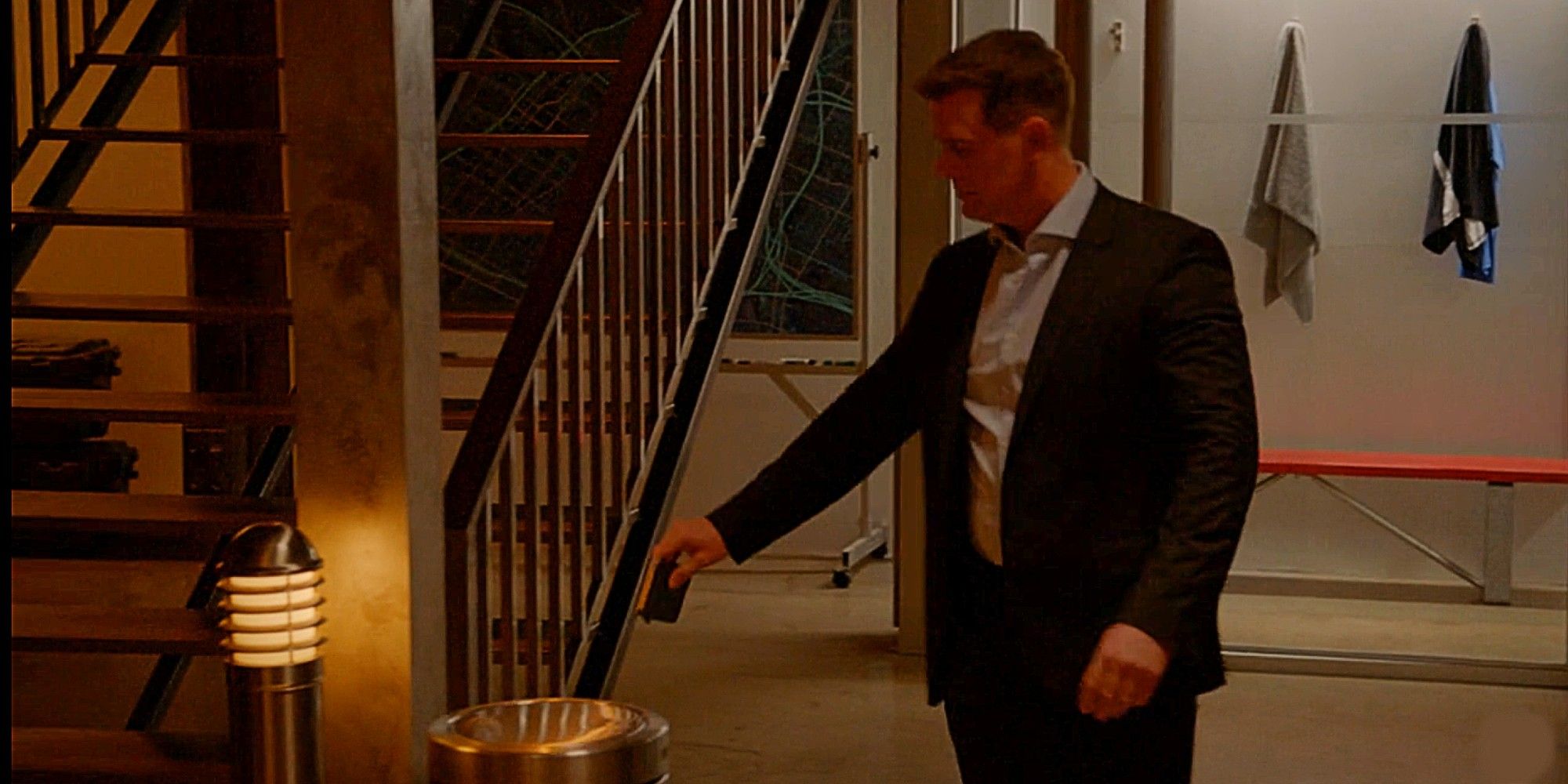 Bobby Nash throwing his book of names away in 9-1-1 Season 1.