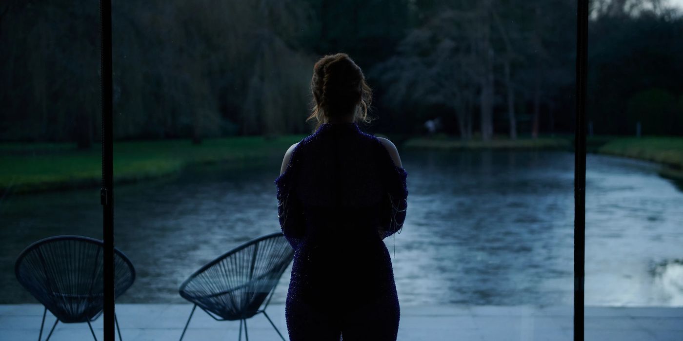 Julia Brown as Laura in &lsquo;Daddy&rsquo;s Head&rsquo; Looking into her backyard