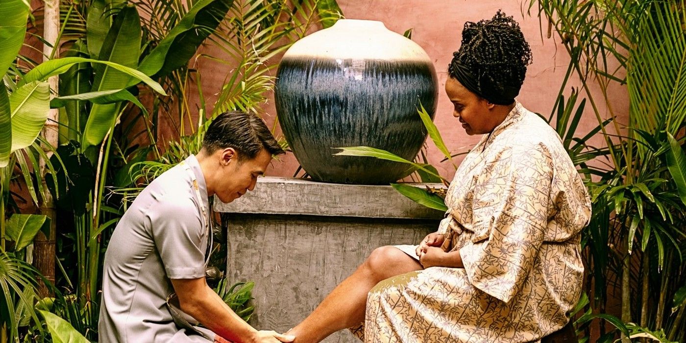 Pornchai massaging Belinda&rsquo;s feet in The White Lotus Season 3.