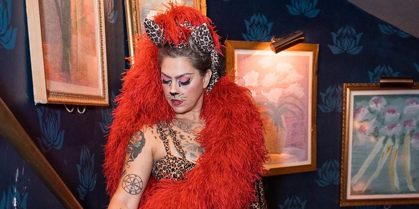 Danielle Colby's posing for a burlesque portrait