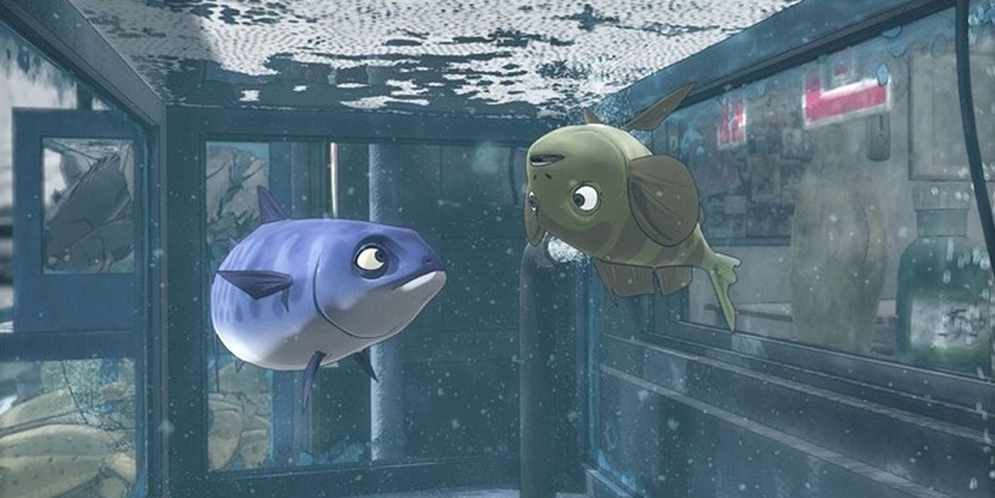 A mackarel looking at a dead fish in a fish tank in &lsquo;Padak&rsquo;