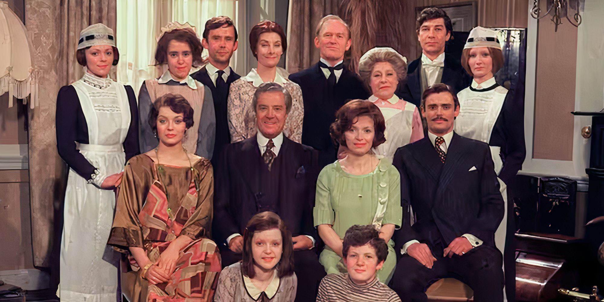 A promotional shot of all characters in Upstairs, Downstairs smiling at the camera.