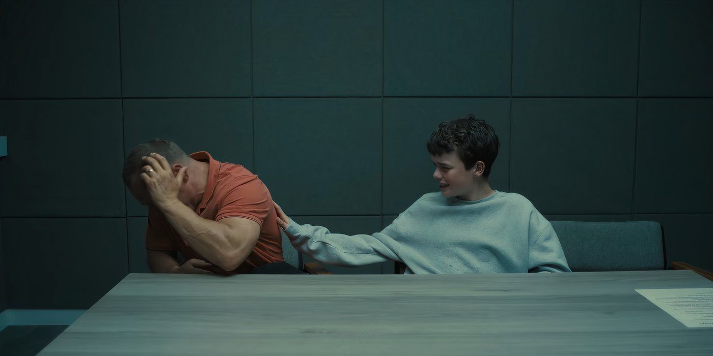 Jamie Miller (Owen Cooper) tries to talk to his distraught father, Eddie (Stephen Graham) in an interrogation room in Adolescence on Netflix.