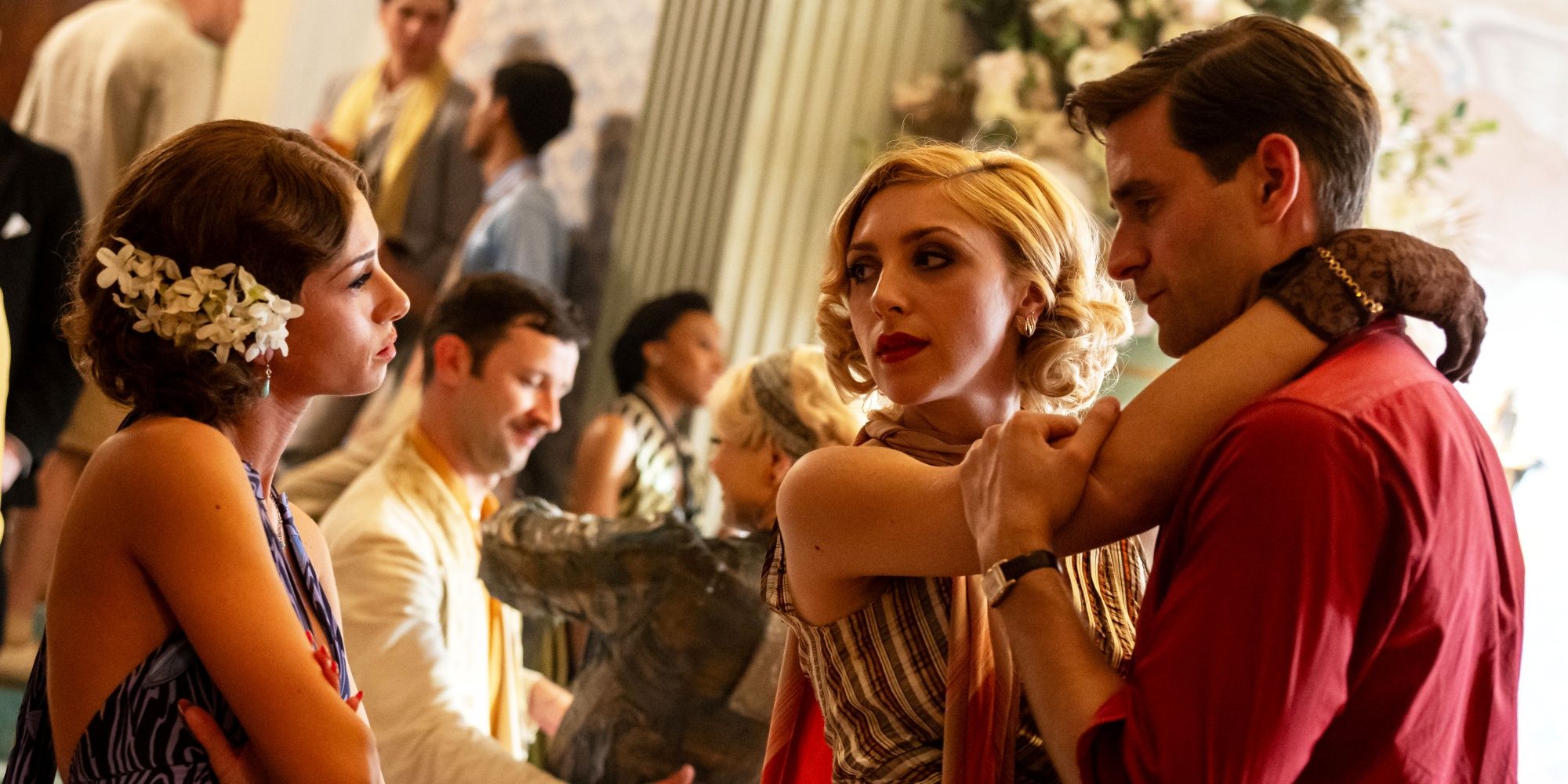 Oliver Jackson-Cohen as Neville dancing with Ella Lily Hyland as Mimi Keene approaches in Towards Zero