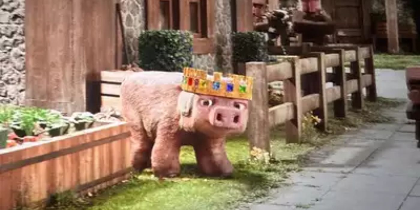 A pig wearing a jeweled crown stands by a fence in A Minecraft Movie.