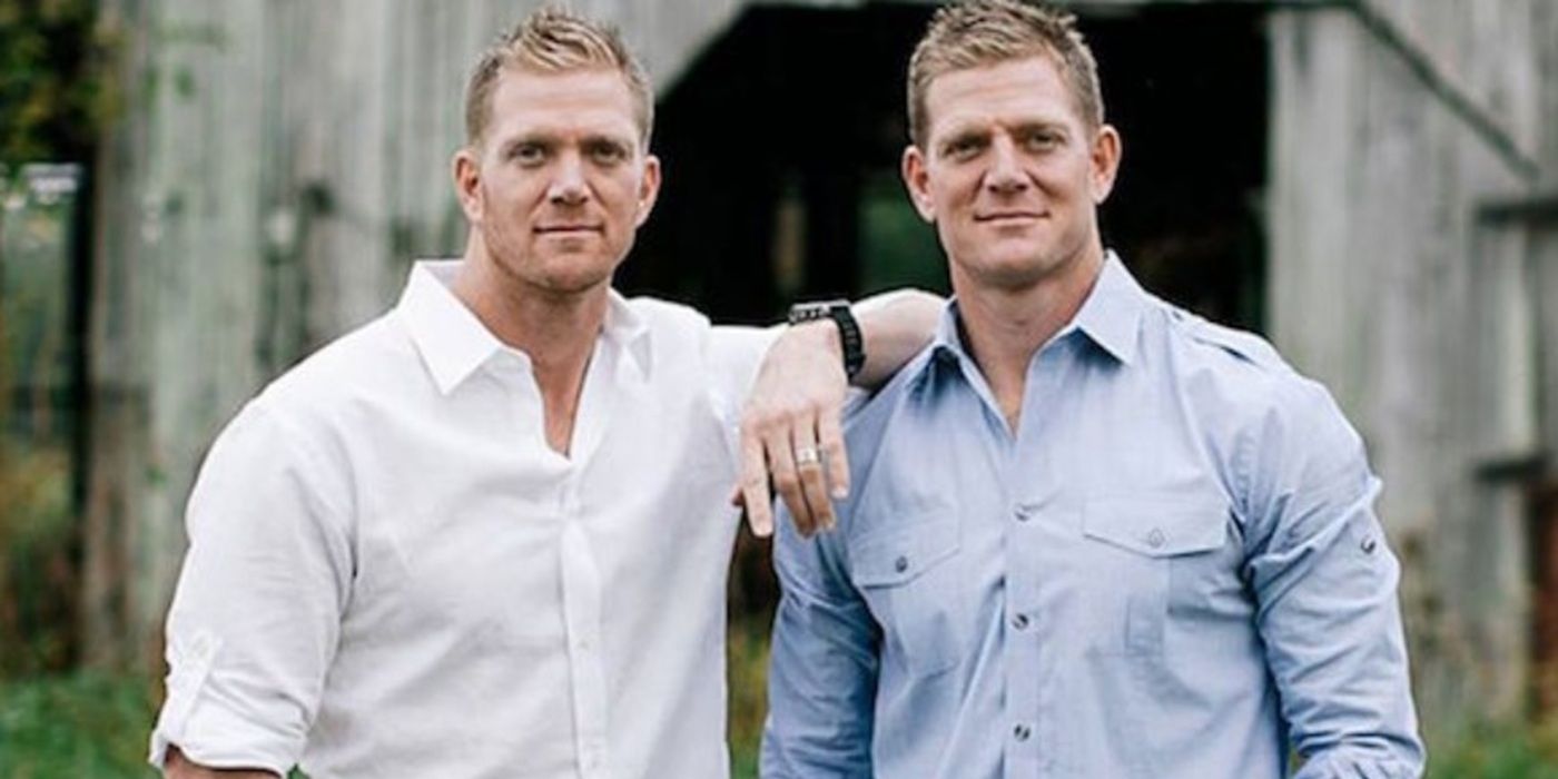 David and Jason Benham from Flip it Forward stand next to each other outside with a rustic barn behind them.