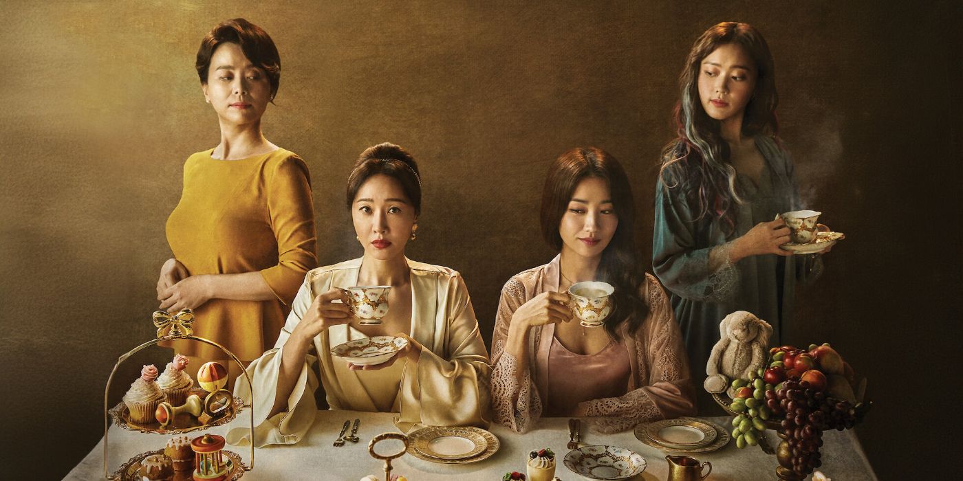 The cast of Birthcare Center holding tea cups.