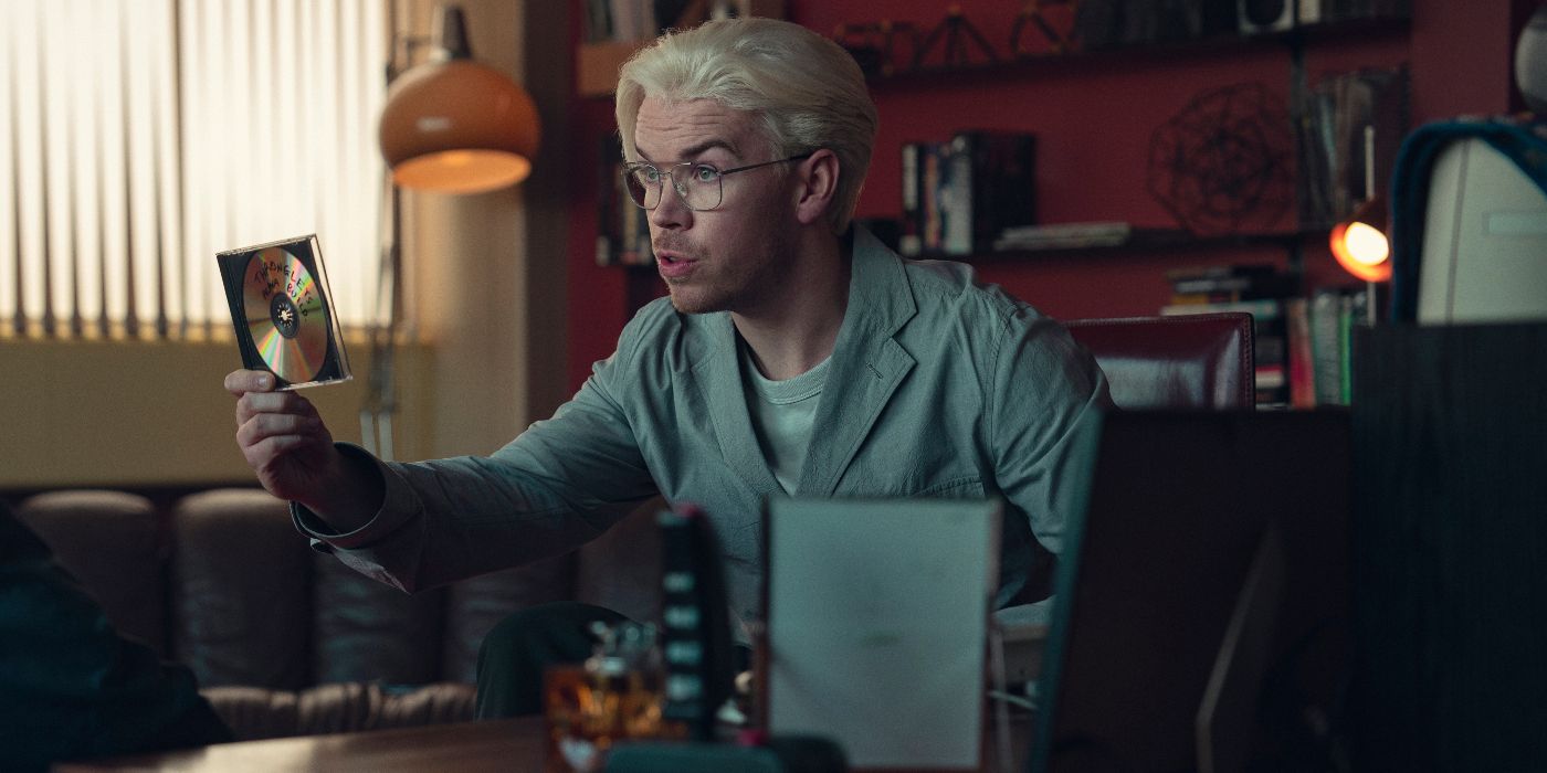Will Poulter looking at a disc in Black Mirror Season 7&rsquo;s Plaything.