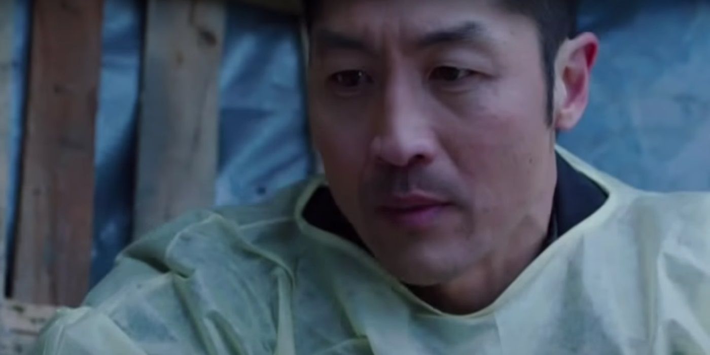 Brian Tee as Ethan Choi looks concerned, wearing medical scrubs in Chicago Med.