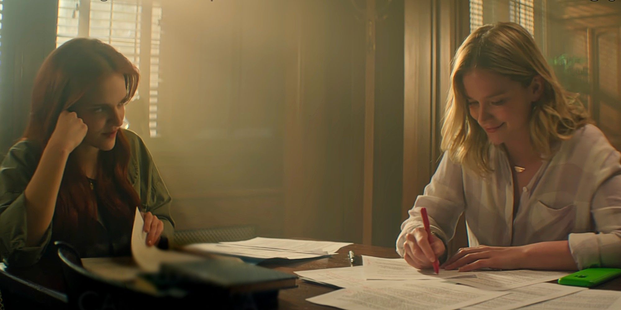 MAJOR SPOILERS for You Season 5 - embargoed until 4/24 - Bronte and Guinevere Beck sitting at a table together in You.