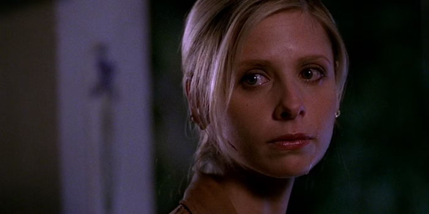 Buffy looking over her shoulder with tears in her eyes in Buffy the Vampire Slayer.