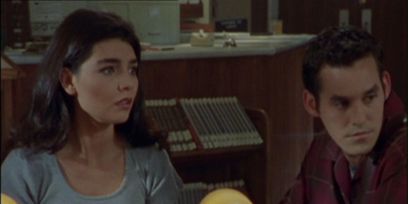 Xander and Ampata sitting close in Buffy the Vampire Slayer.