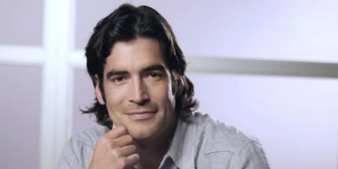 Carter Oosterhouse from Carter Can posing with his hand resting on his chin and smiling at the camera.