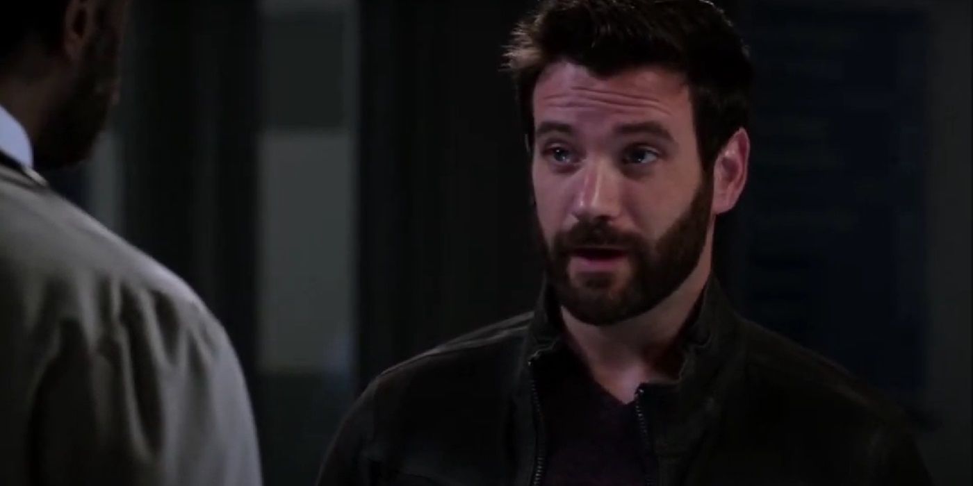 Colin Donnell talking to someone with their back to the camera in Chicago Med.