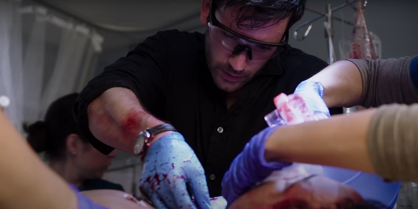 Colin Donnell treating a patient as  Dr. Connor Rhodes in Season 1, Episode 1 &ldquo;Derailed&rdquo; of &lsquo;Chicago Med&rsquo;.