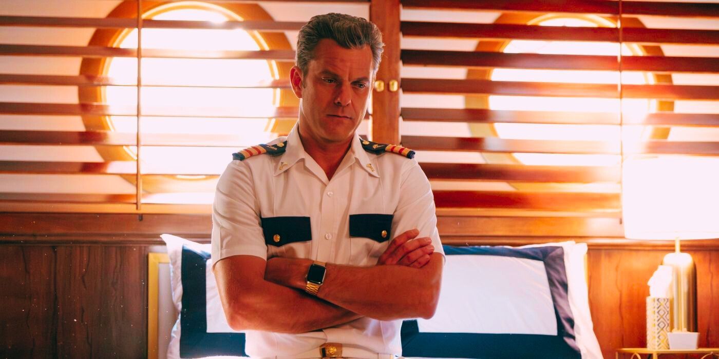 Joshua Jackson standing with his arms crossed in Doctor Odyssey Episode 12