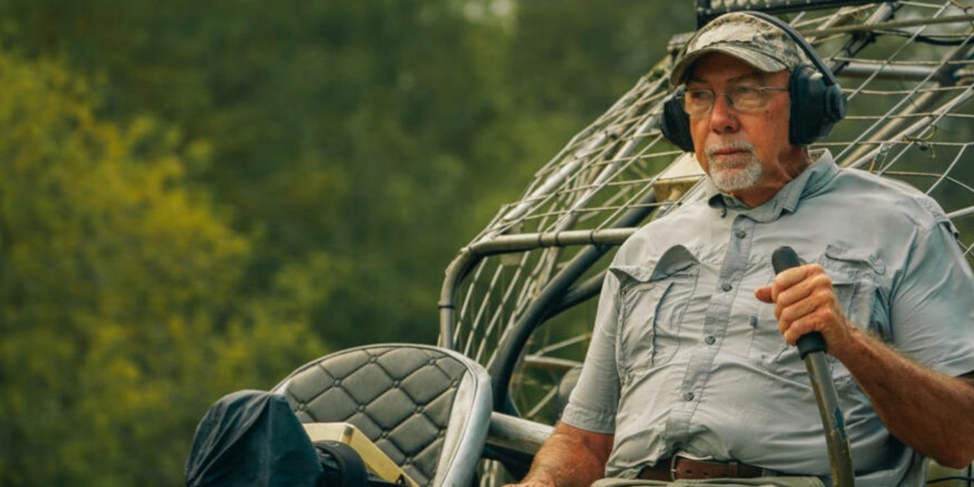 Daniel Edgar from Swamp People sits on an airboat during a gator hunt.