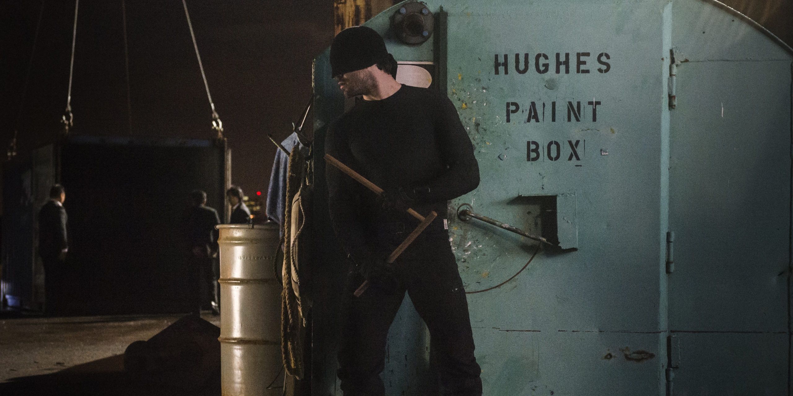 Daredevil a man in a black mask sneaking around