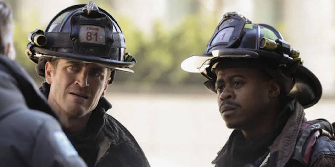 Darren Ritter (Daniel Kyri) and Sam Carver (Jake Lockett) in fire gear in Chicago Fire.