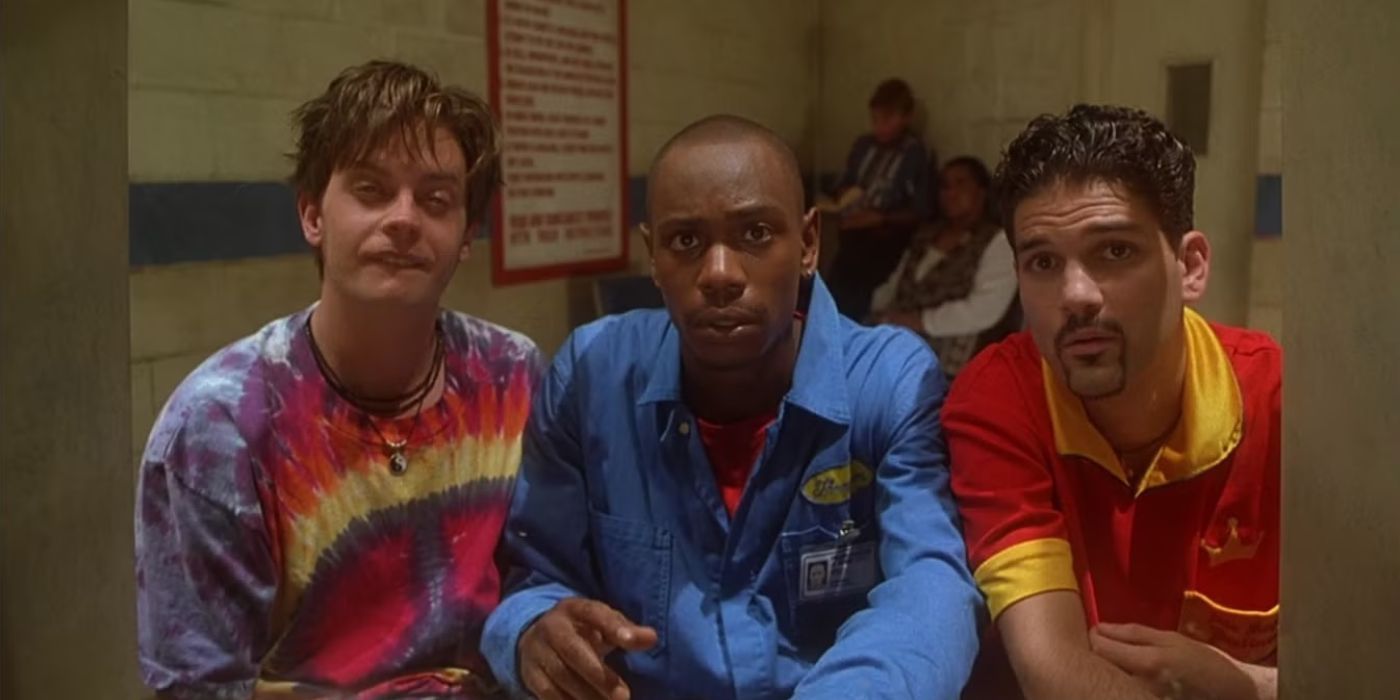Dave Chappelle, Jim Breuer, and Guillermo Diaz sit next to each other and look concerned in Half Baked.