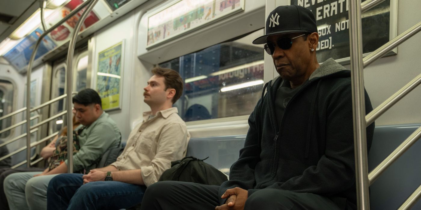Denzel Washington wearing a Yankees cap and sunglasses while sitting in a subway train in Spike Lee&rsquo;s latest joint, Highest 2 Lowest.