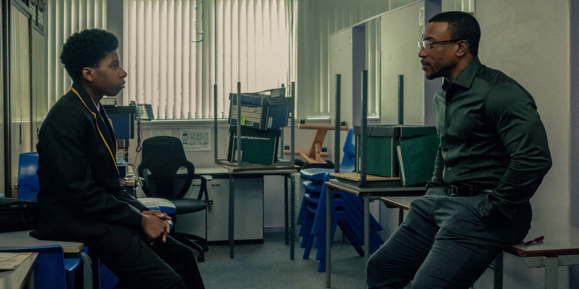 detective-bascombe-and-his-son-adam-talking-in-an-empty-classroom