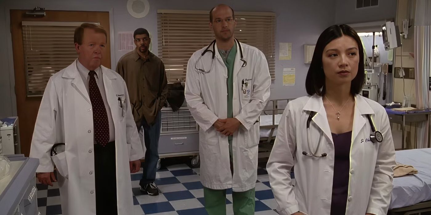 Eriq La Salle as Peter, Anthony Edwards as Mark and Ming-Na Wen as Jing-Mei in a patient room in ER.