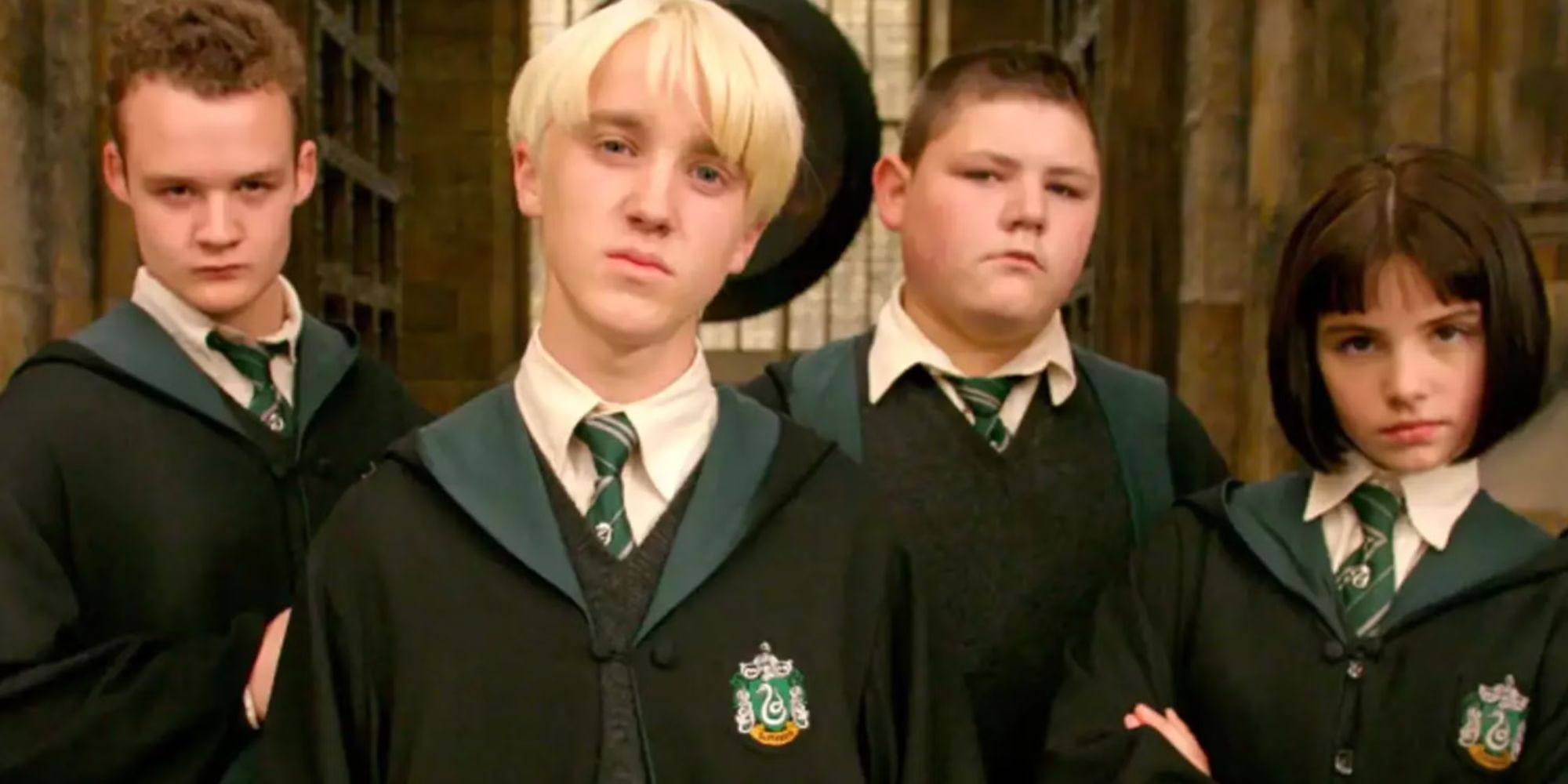 Pansy Parkinson stands sulkily with Draco Malfoy, Crabbe and Goyle in Harry Potter and the Prisoner of Azkaban.