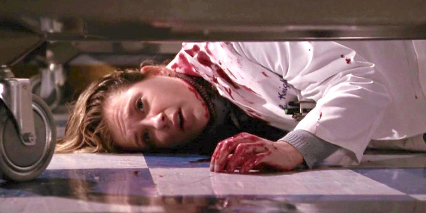 Lucy Knight (Kellie Martin) lying on the floor covered in blood in ER.