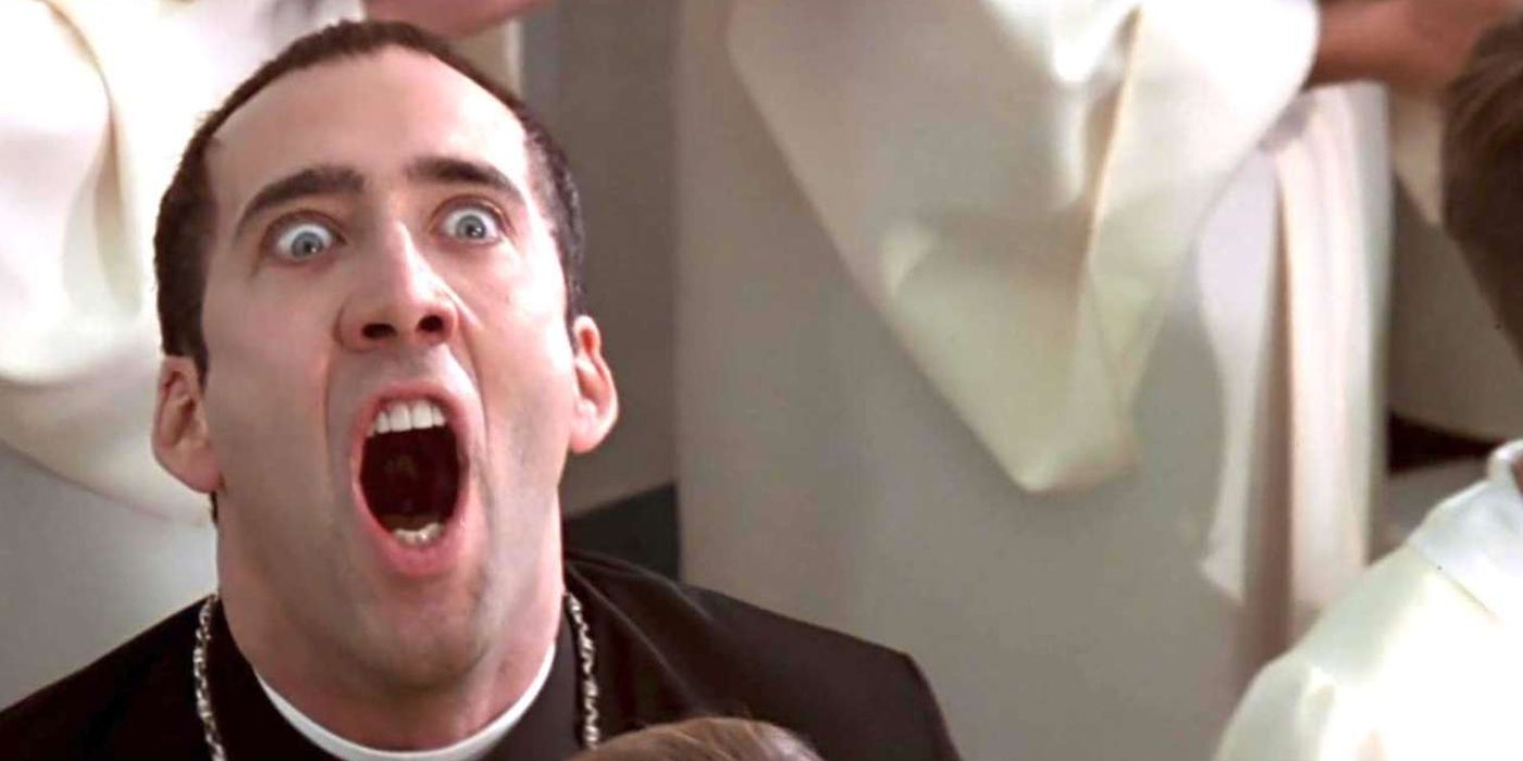 Castor Troy dressed as a priest screaming in Face/Off