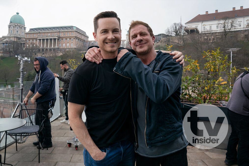Jesse Lee Soffer and Kenny Johnson are captured on set beaming at the camera