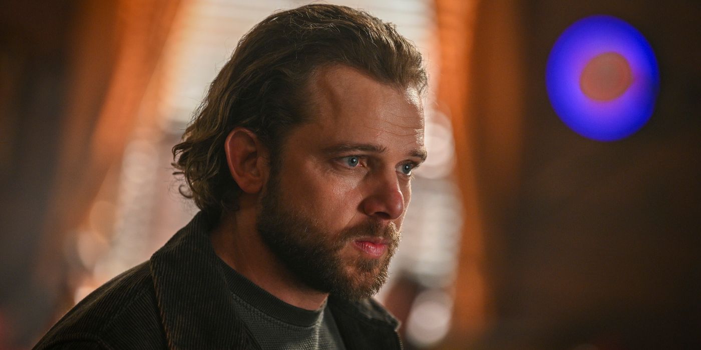 Max Thieriot looking down at something offscreen in Fire Country Season 3 Episode 18