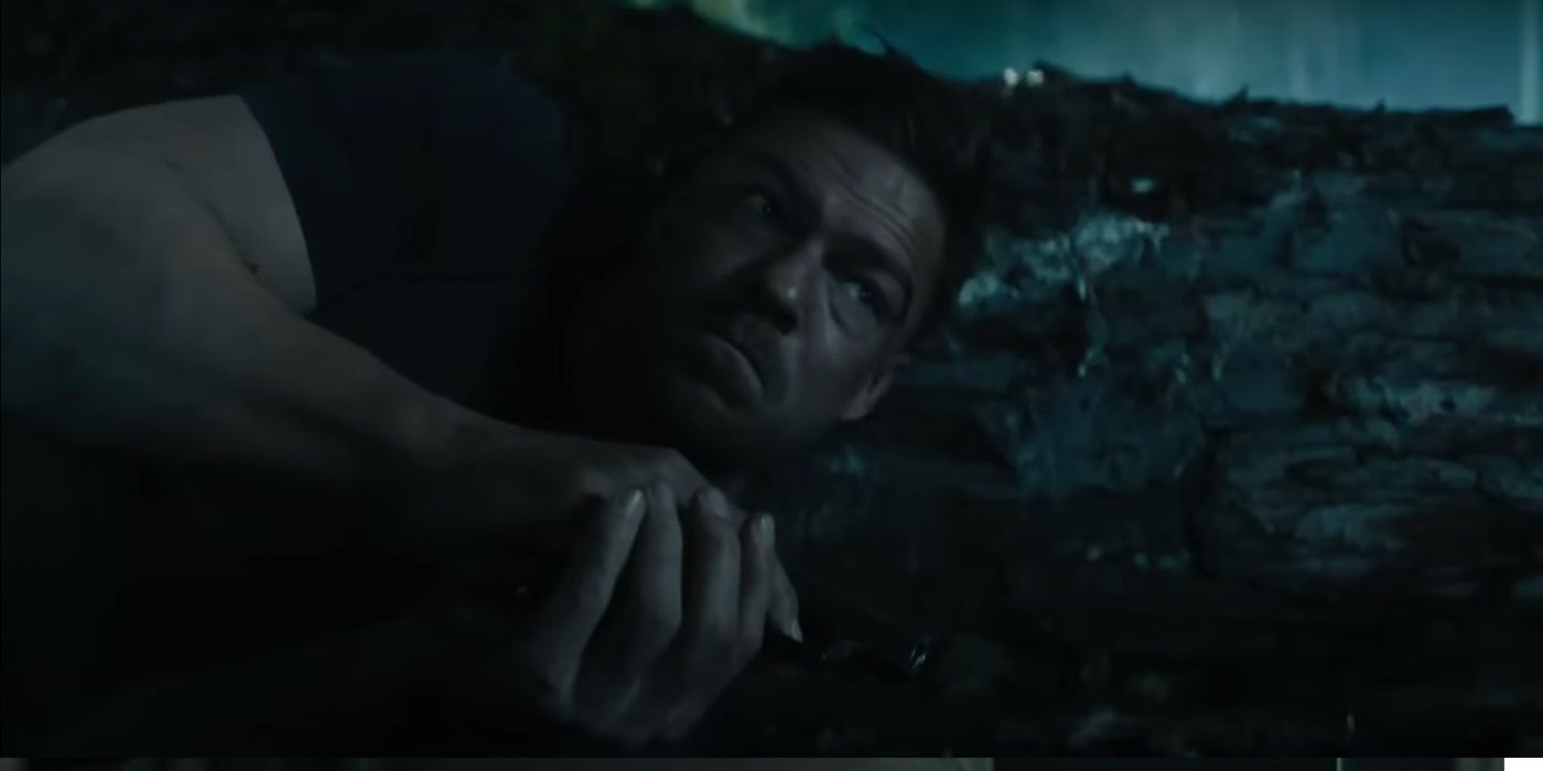 Reacher (Alan Ritchson) hiding in the forest with a gun in the Forest Fight Scene in Season 3, Episode 7 of &lsquo;Reacher&rsquo;
